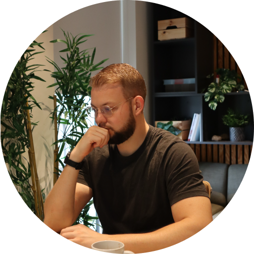 Image of Rune Pjetursson sitting contemplating work at his desk